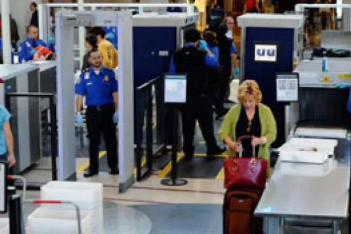a group of people at an airport